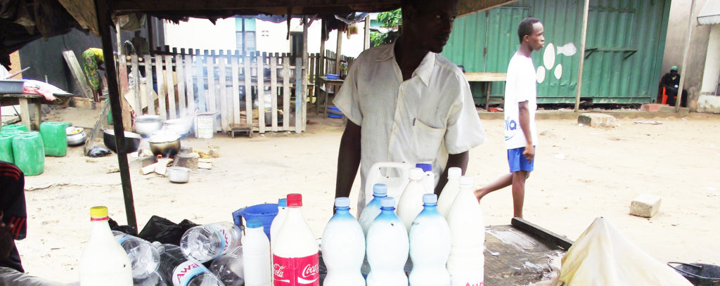 Informal sale of raw milk in Abidjan