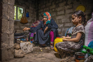 Bodour and her granddaughter, Lames, 6, preparing lunch at home.